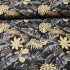Tissu en coton au mètre, 125 g/m², largeur 160 cm, imprimé à feuilles sur fond noir