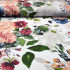 Tissu en coton au mètre, 125 g/m², largeur 160 cm, imprimé à fleurs sur fond blanc